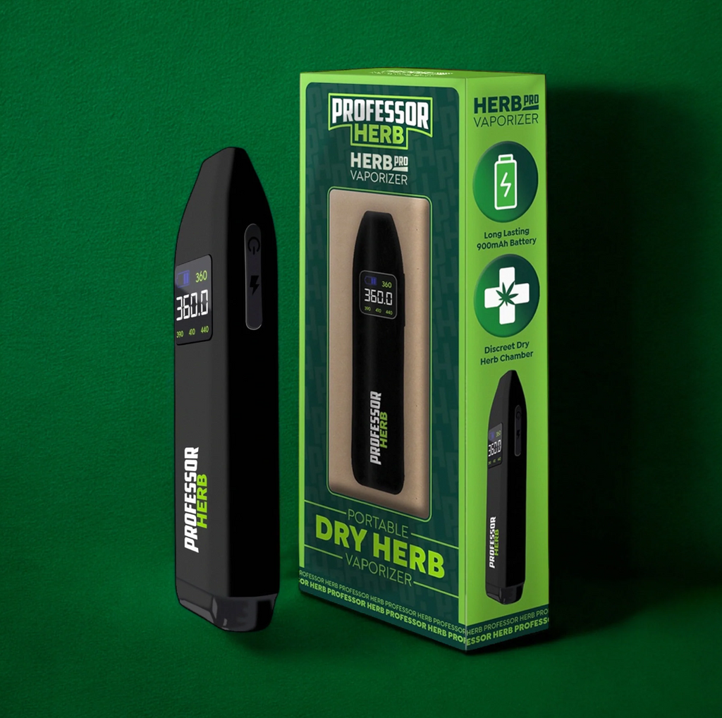 Black dry herb vaporizer with green packaging on a dark green background